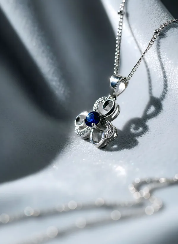 Floral_Pendant_With_Blue_Sapphire_Tone_Stone_925_Sterling_Silver